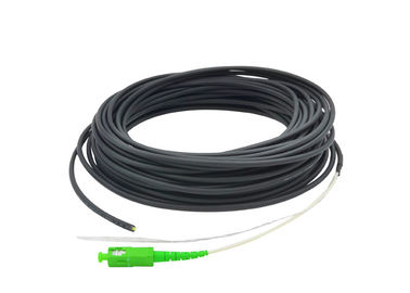 Hitam 4.0 FTTH Drop Cable Fiber Optical Patch Cord Dengan 2.0 Konektor SC / APC