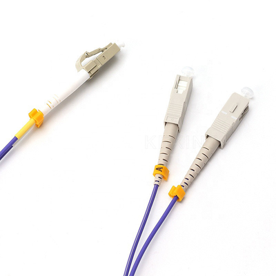 Kabel Patch Serat Optik FTTH Duplex MM OM2 SC LC yang Dapat Disesuaikan 50/125 2.0mm 3m LSZH Ungu